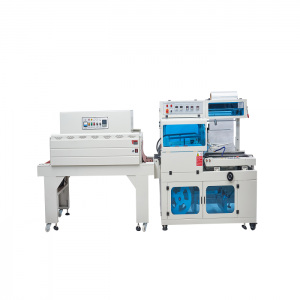 Sealing and cutting shrink packaging machine
